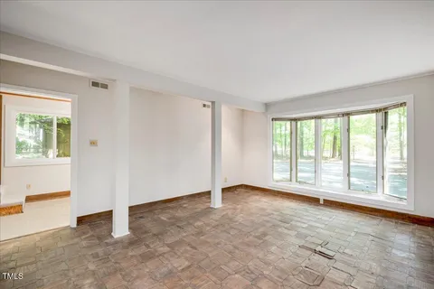 an empty room with windows