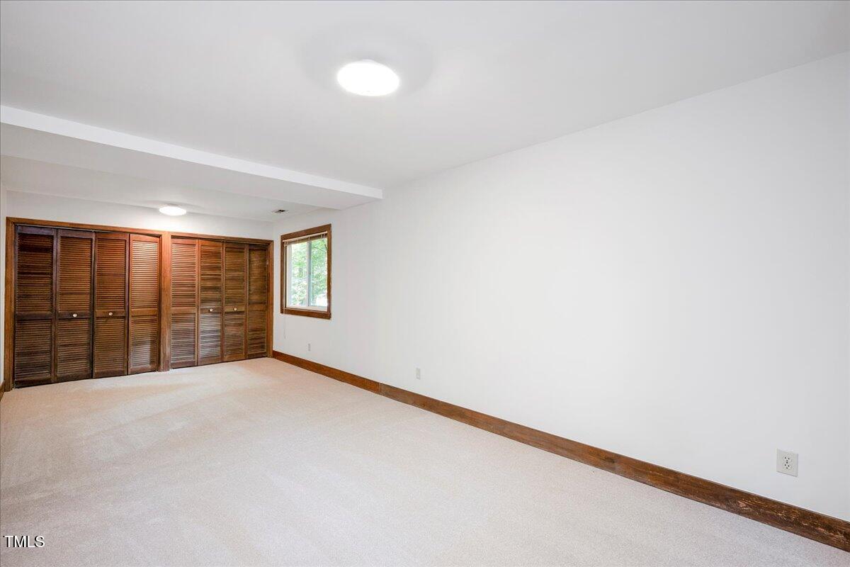 11637 Appaloosa Run West Raleigh, NC 27613 - Photo 18 of 29 a view of an empty room with a window