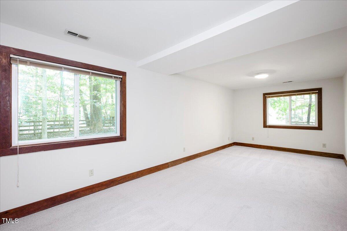 11637 Appaloosa Run West Raleigh, NC 27613 - Photo 19 of 29 a view of an empty room with a window