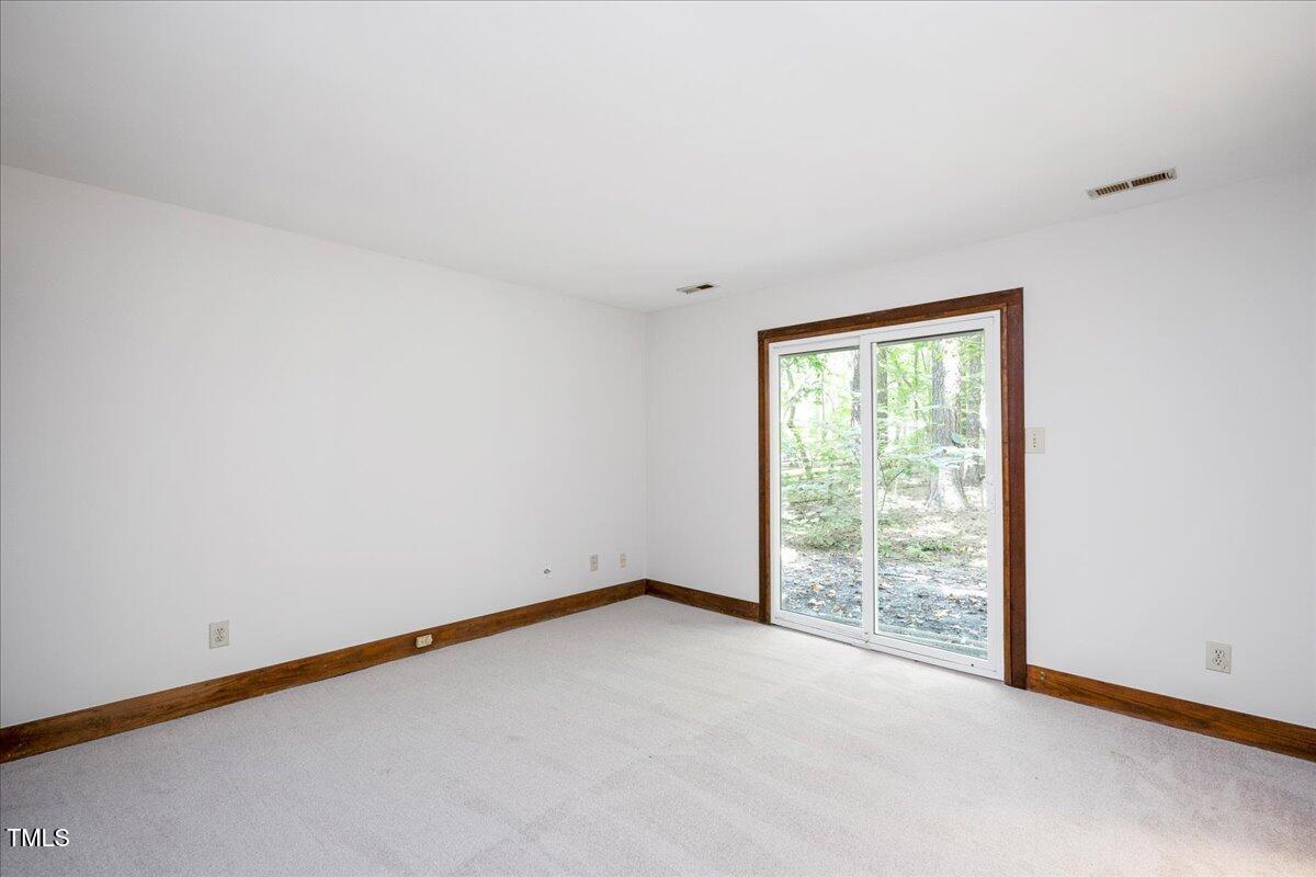 11637 Appaloosa Run West Raleigh, NC 27613 - Photo 20 of 29 an empty room with a window
