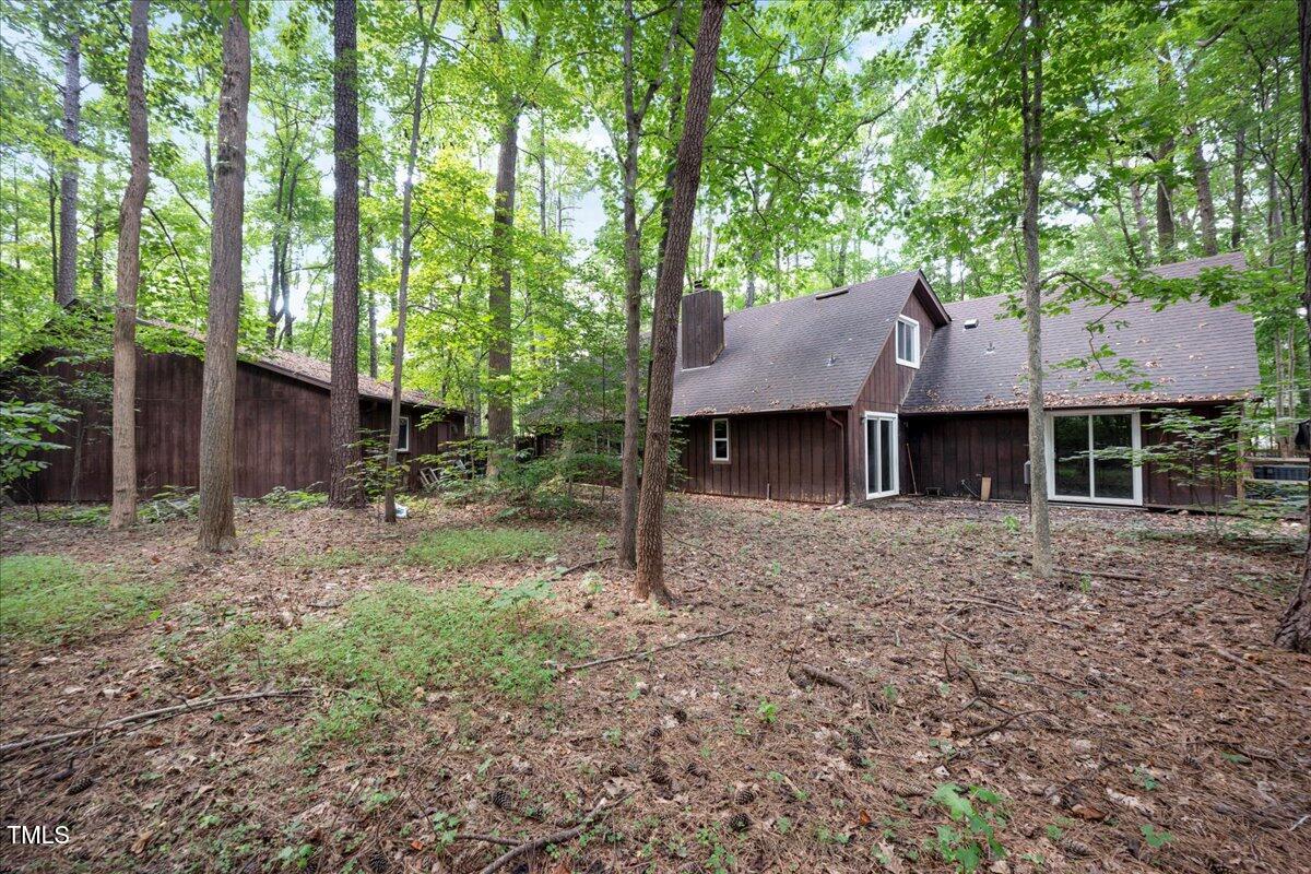 11637 Appaloosa Run West Raleigh, NC 27613 - Photo 29 of 29 a view of a house with yard and a tree