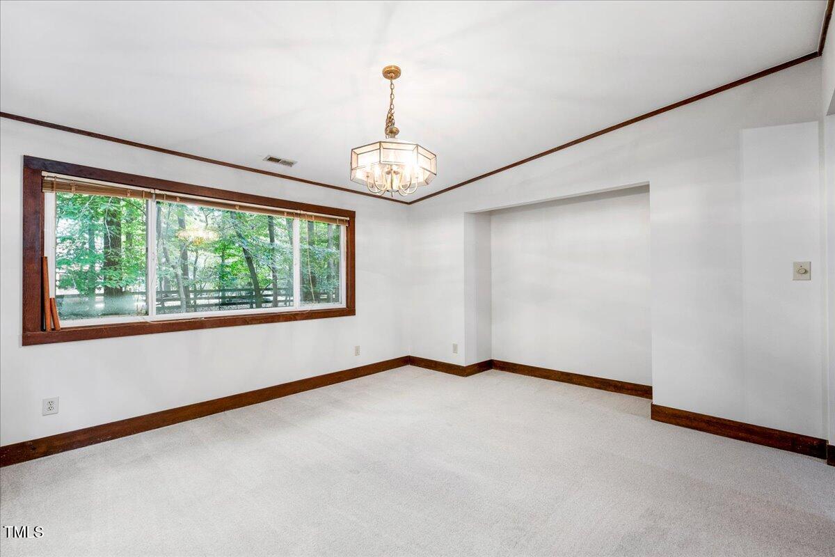 11637 Appaloosa Run West Raleigh, NC 27613 - Photo 3 of 29 a view of an empty room with a window