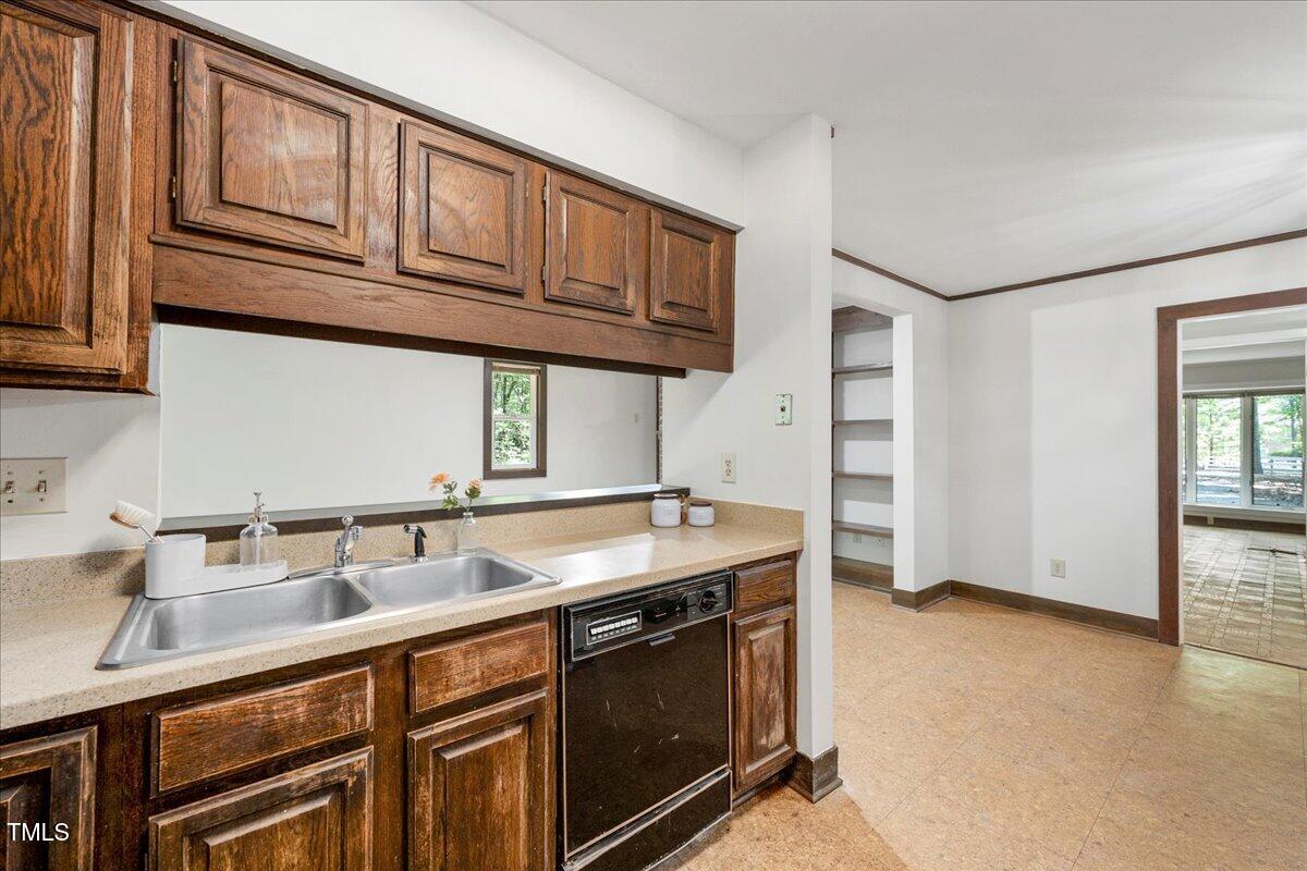 11637 Appaloosa Run West Raleigh, NC 27613 - Photo 8 of 29 a kitchen with stainless steel appliances granite countertop a sink and a stove