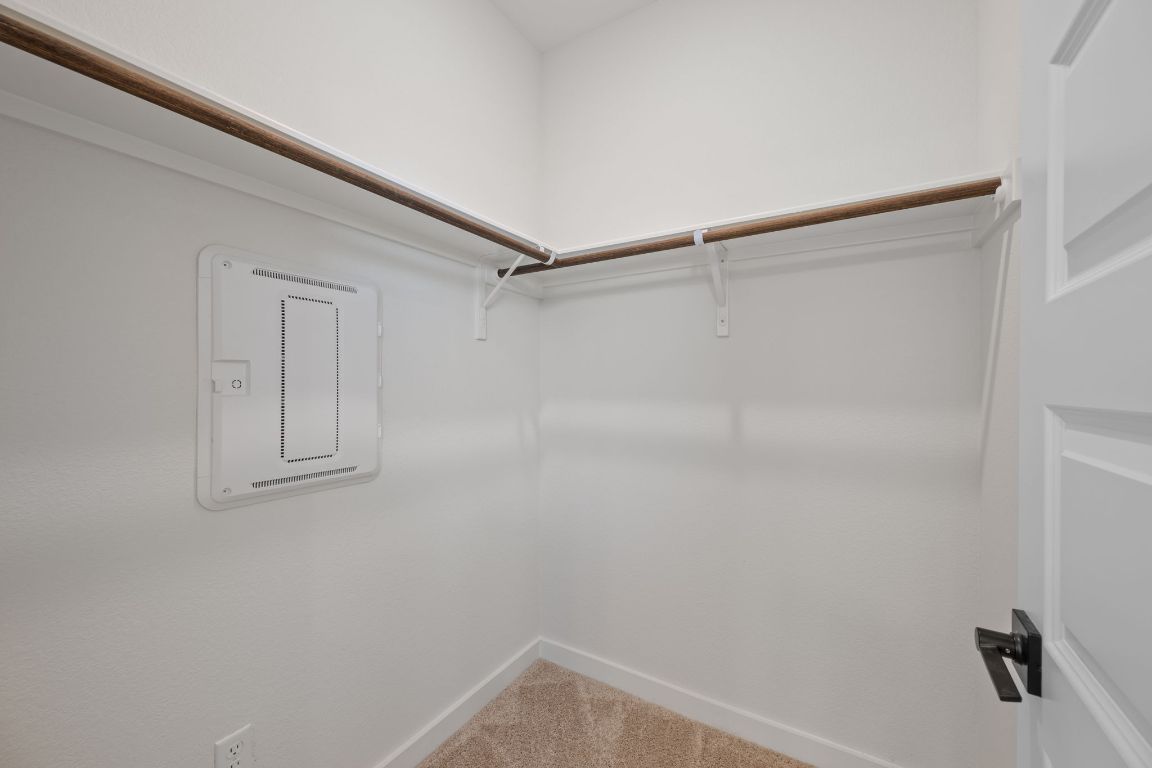 2600 Gattis School Road, Unit 1202 Round Rock, TX 78664 - Photo 14 of 24 Walk in closet featuring light carpet and electric panel