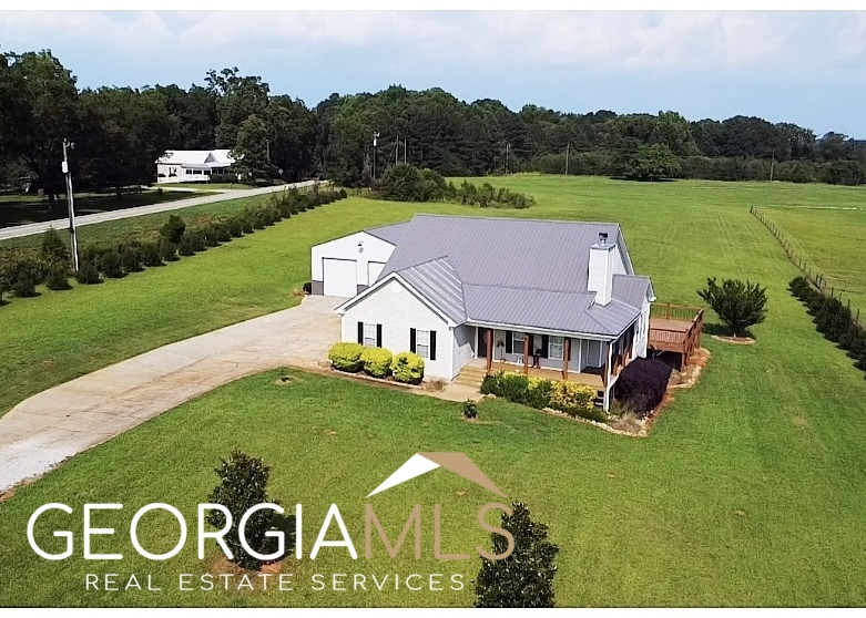 111 Jim McMichael Road Jackson, GA 30233 - Photo 1 of 1 a view of a house with a big yard