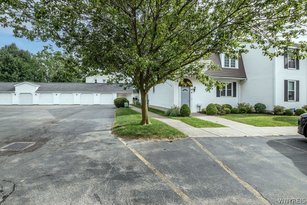 4755 Chestnut Ridge Road, Unit 9 Amherst, NY 14228 - Photo 7 of 46 Front parking spot and tons of guest parking spots.