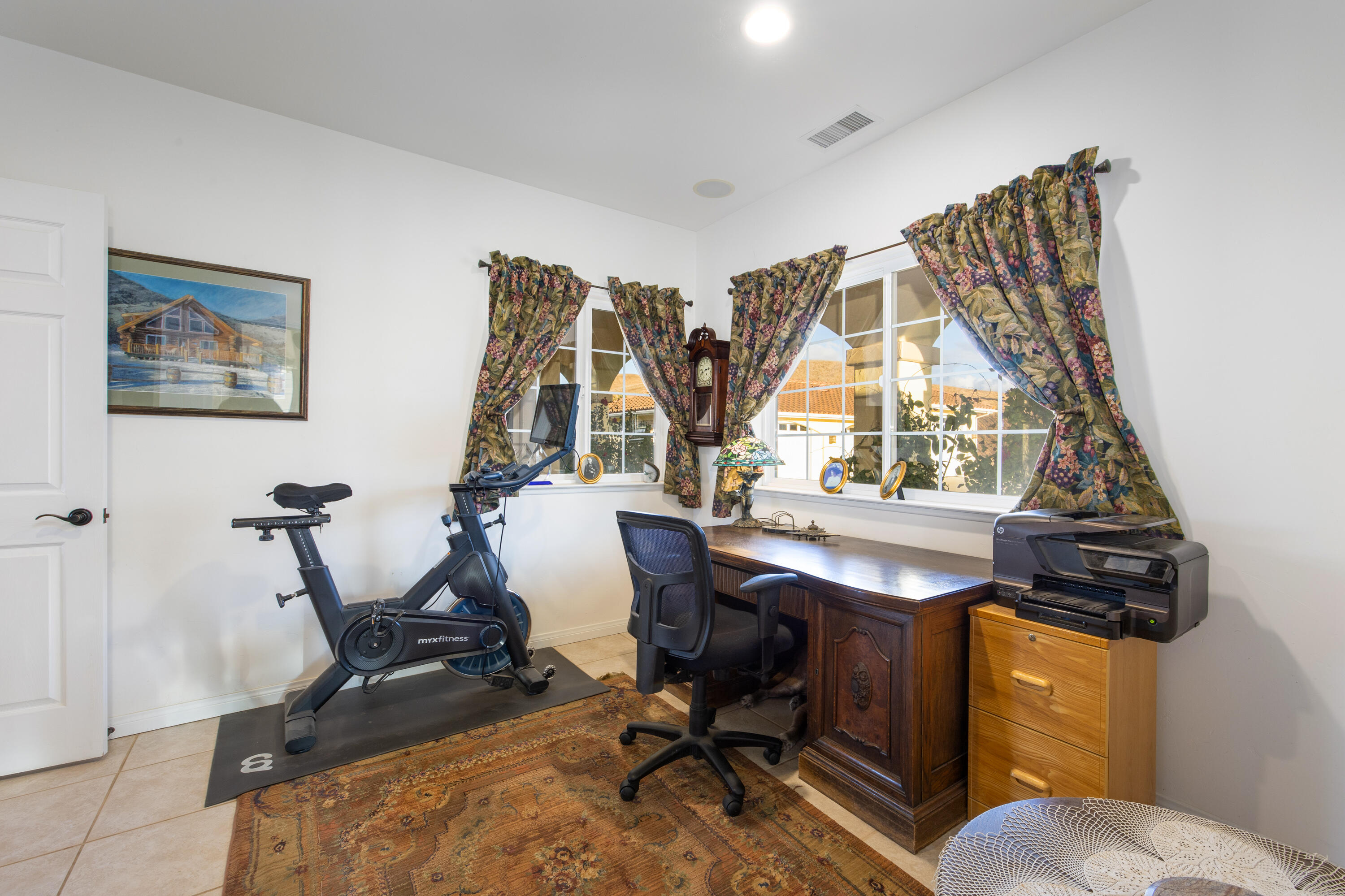 7253 Santos Road Lompoc, CA 93436 - Photo 17 of 28 a view of a workspace with furniture and a window