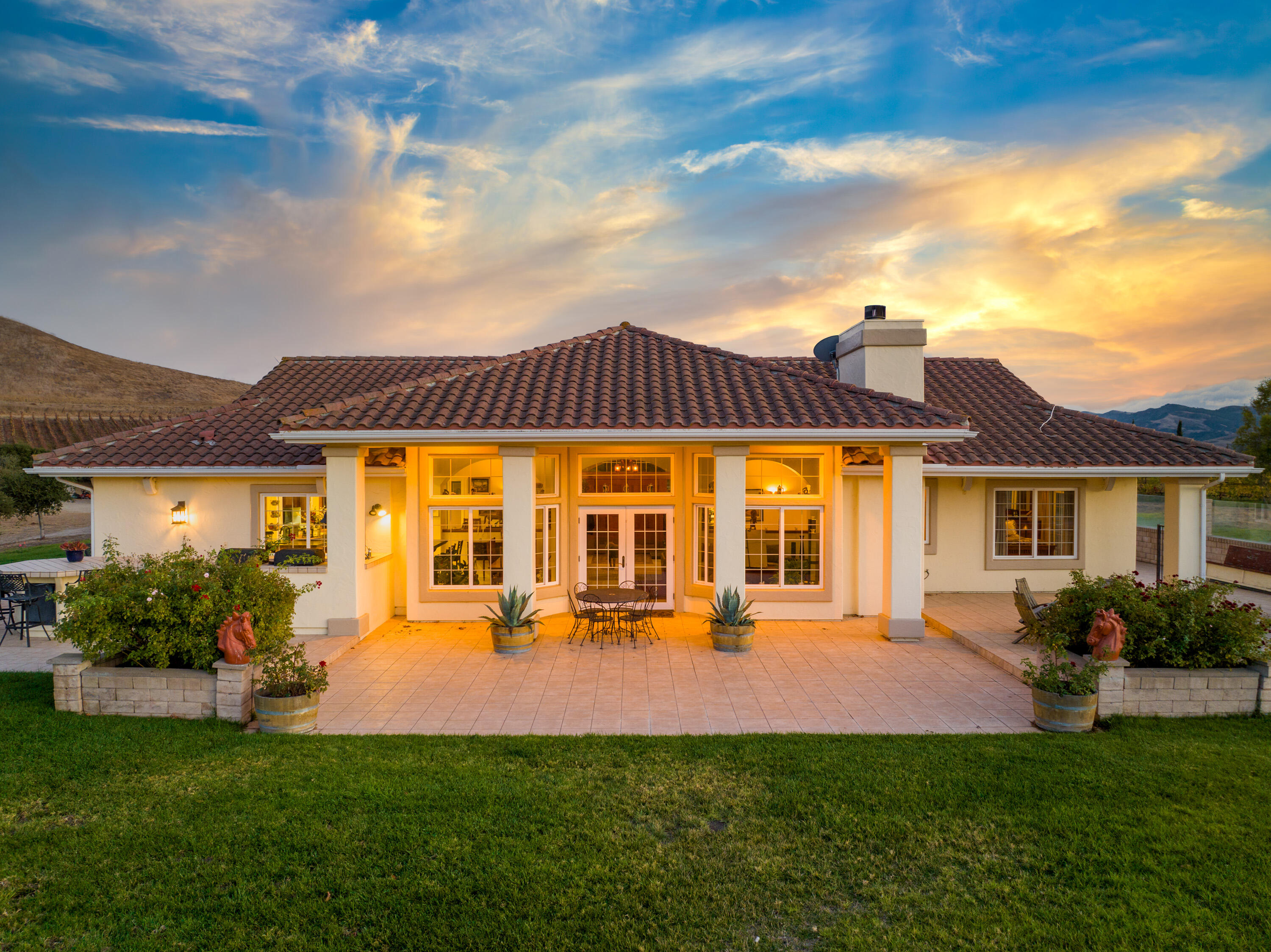 7253 Santos Road Lompoc, CA 93436 - Photo 20 of 28 a front view of a house with a yard