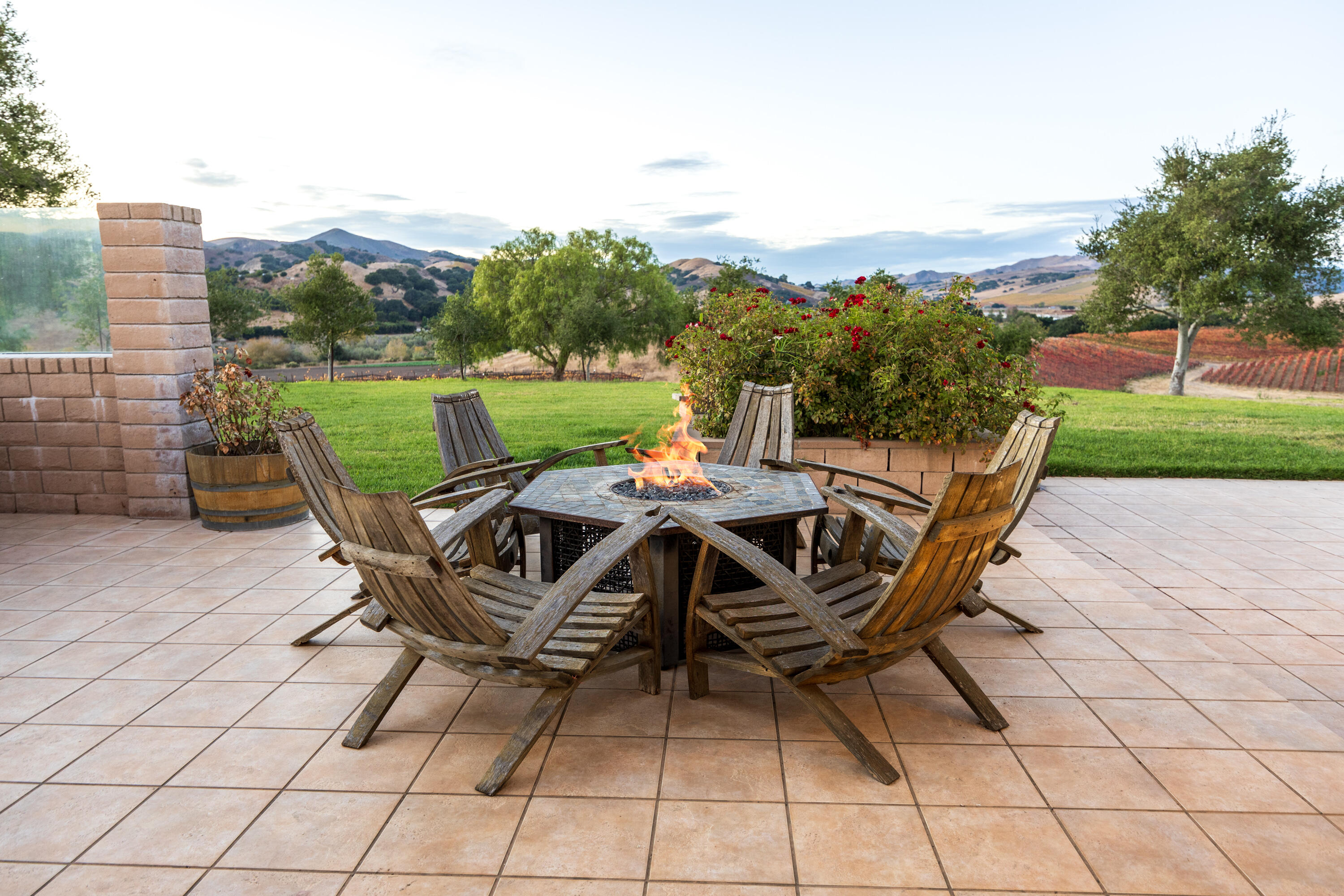 7253 Santos Road Lompoc, CA 93436 - Photo 21 of 28 a view of a terrace with furniture and a garden