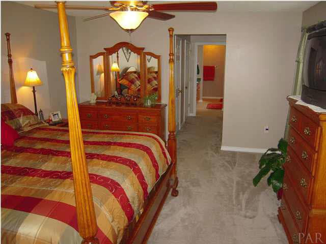 4762 Ribault Lane Milton, FL 32570 - Photo 20 of 24 Looking down hall to master bath.