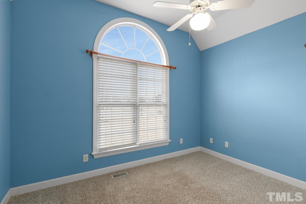 10839 McKenzie Road Bailey, NC 27807 - Photo 22 of 37 an empty room with a window