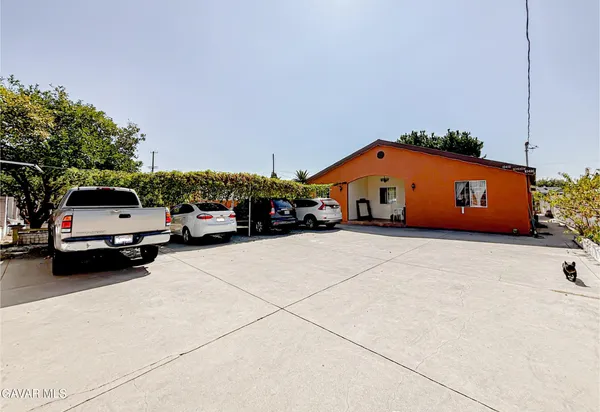 a car parked in front of a house