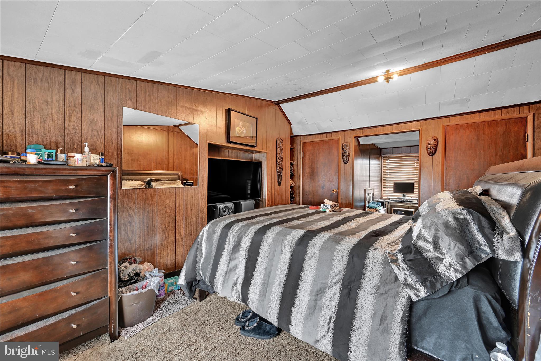 936 Pike Street Reading, PA 19604 - Photo 19 of 24 a bed room with a bed and a television