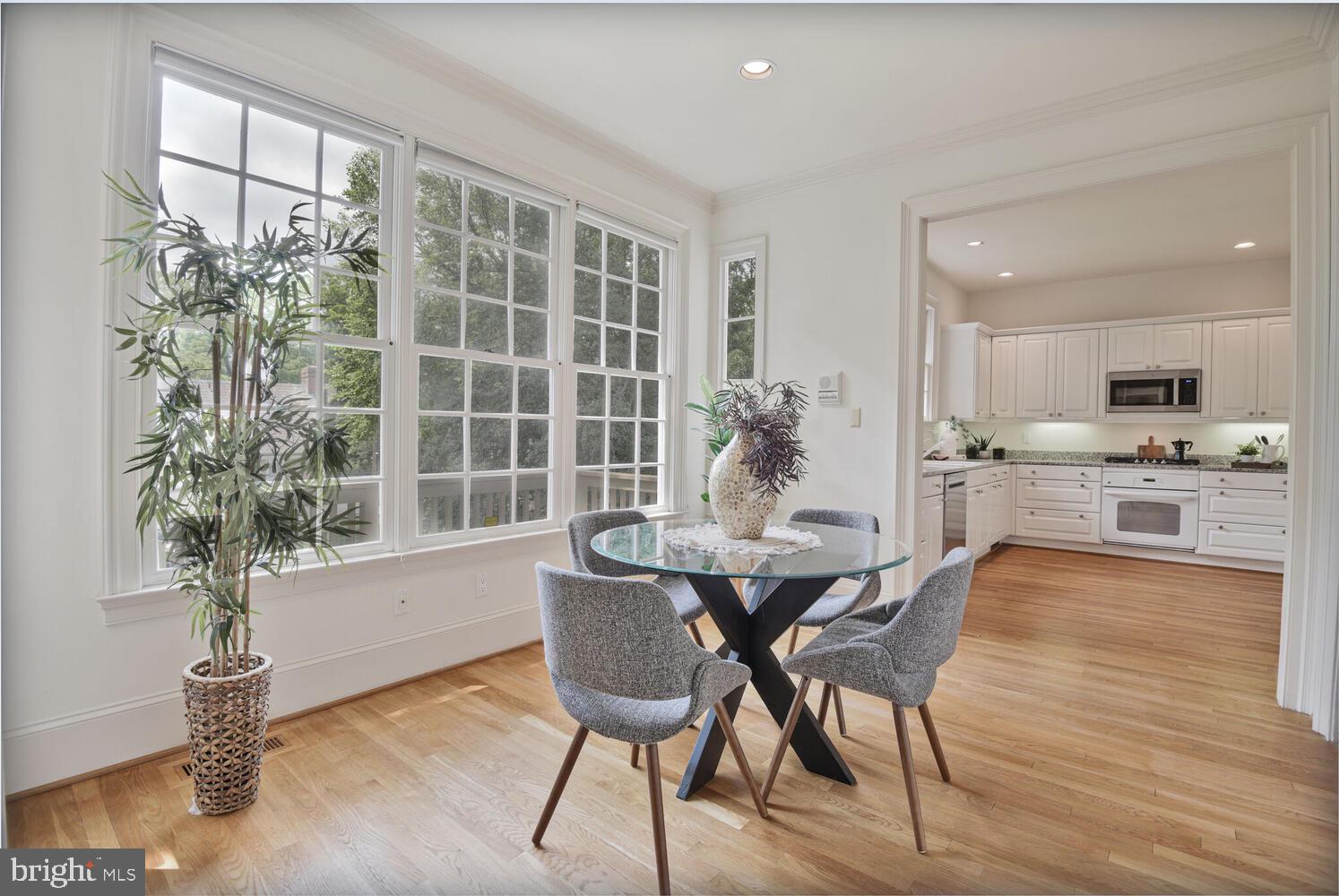 5222 Loughboro Road Northwest Washington, DC 20016 - Photo 12 of 47 a view of a dining room with furniture and window