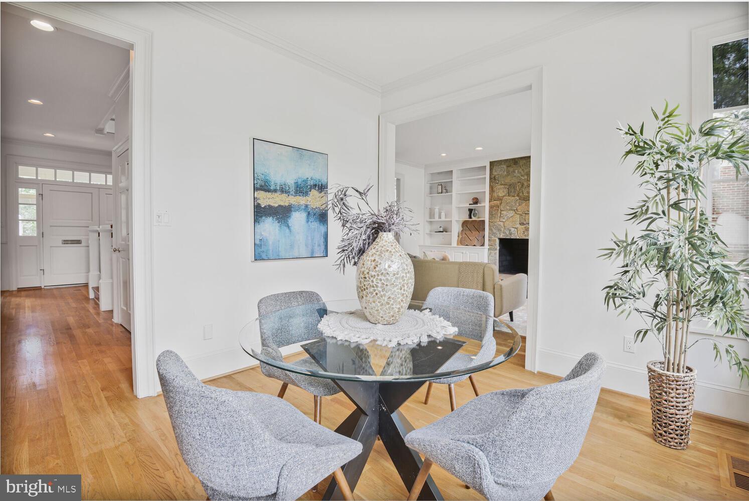 5222 Loughboro Road Northwest Washington, DC 20016 - Photo 13 of 47 a living room with furniture and a potted plant