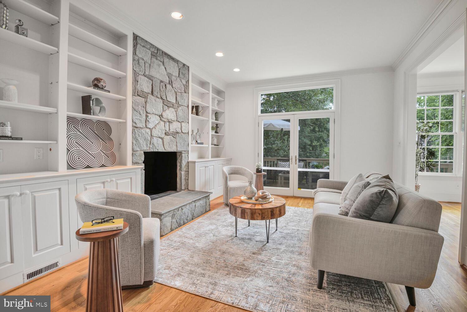 5222 Loughboro Road Northwest Washington, DC 20016 - Photo 15 of 47 a living room with furniture and a fireplace