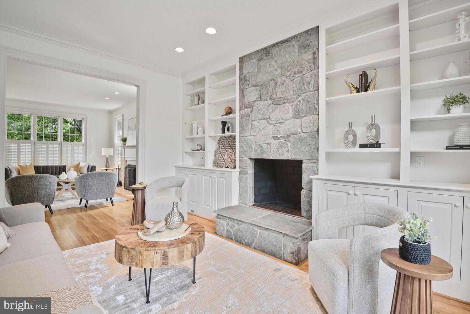 5222 Loughboro Road Northwest Washington, DC 20016 - Photo 16 of 47 a living room with furniture and a fireplace