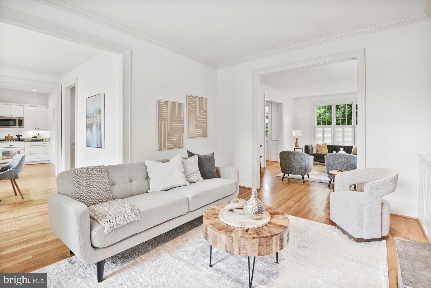 5222 Loughboro Road Northwest Washington, DC 20016 - Photo 17 of 47 a living room with furniture and a wooden floor
