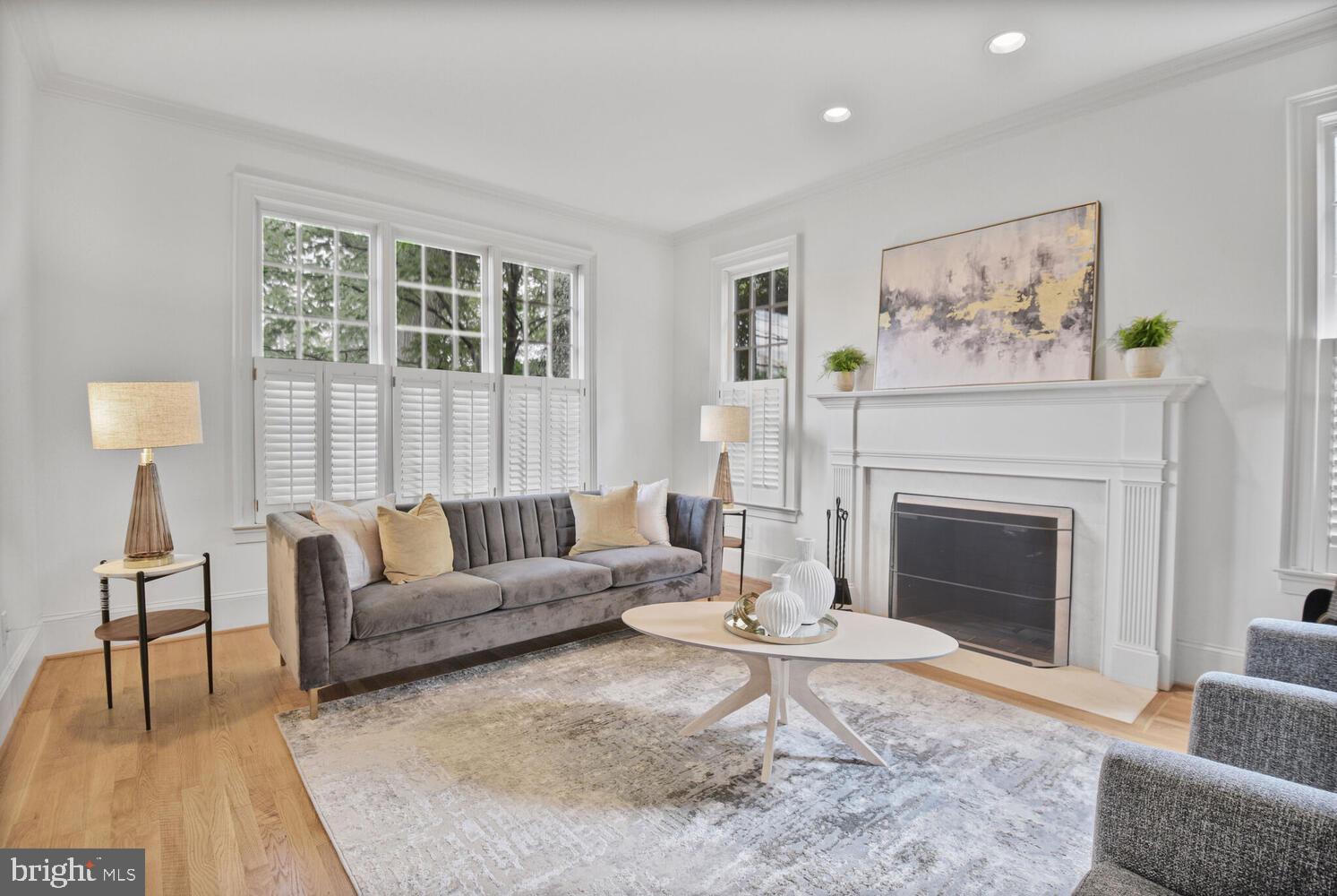 5222 Loughboro Road Northwest Washington, DC 20016 - Photo 19 of 47 a living room with furniture and a fireplace