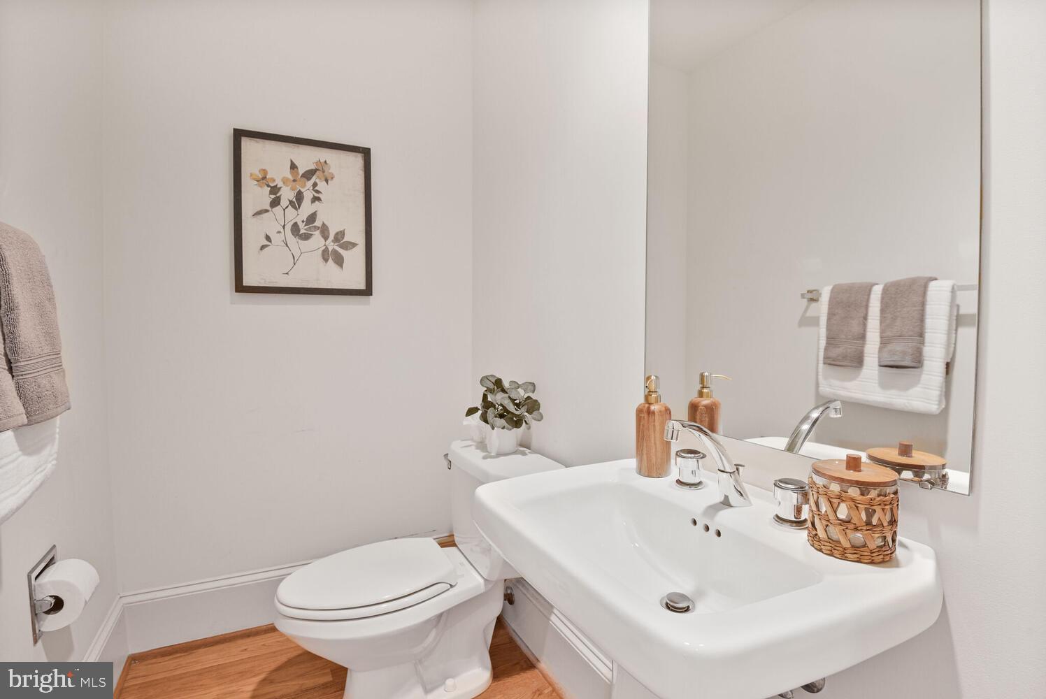 5222 Loughboro Road Northwest Washington, DC 20016 - Photo 21 of 47 a bathroom with a sink and a toilet