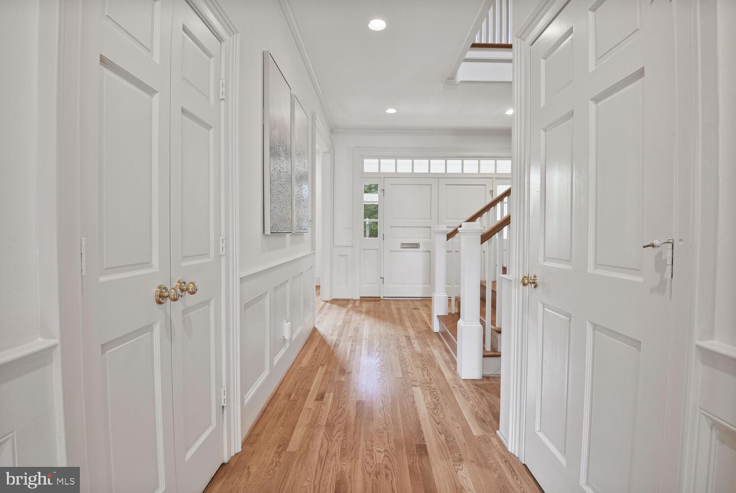 5222 Loughboro Road Northwest Washington, DC 20016 - Photo 22 of 47 a view of a hallway with wooden floor