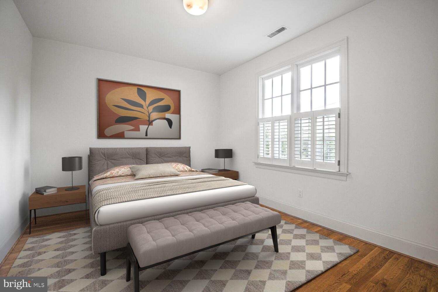 5222 Loughboro Road Northwest Washington, DC 20016 - Photo 30 of 47 a bedroom with a bed and a painting on the wall