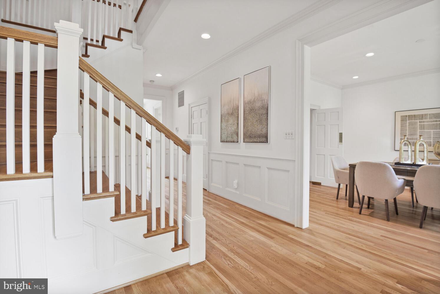 5222 Loughboro Road Northwest Washington, DC 20016 - Photo 3 of 47 a view of entryway with wooden floor and stairs