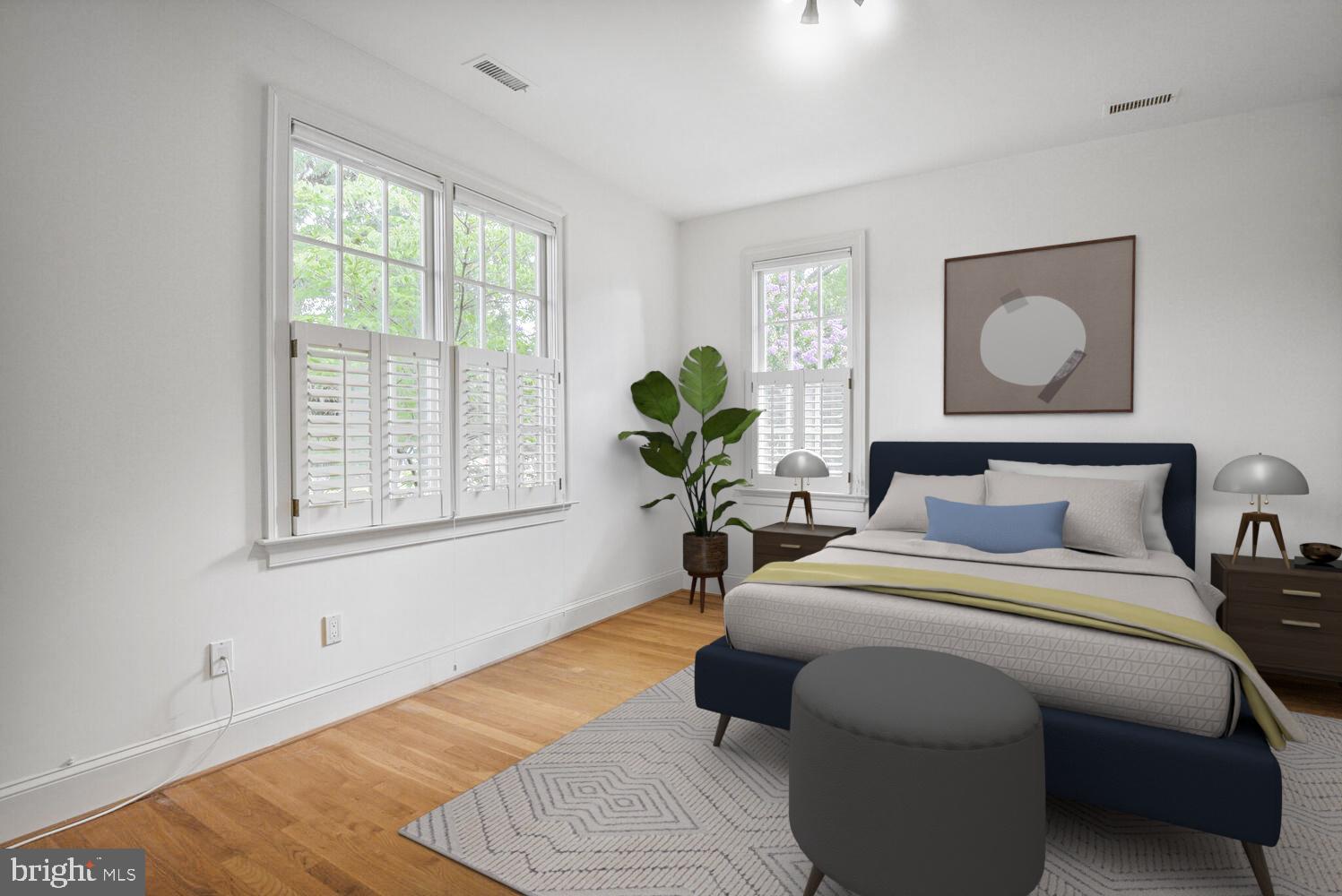 5222 Loughboro Road Northwest Washington, DC 20016 - Photo 31 of 47 a bedroom with bed and window