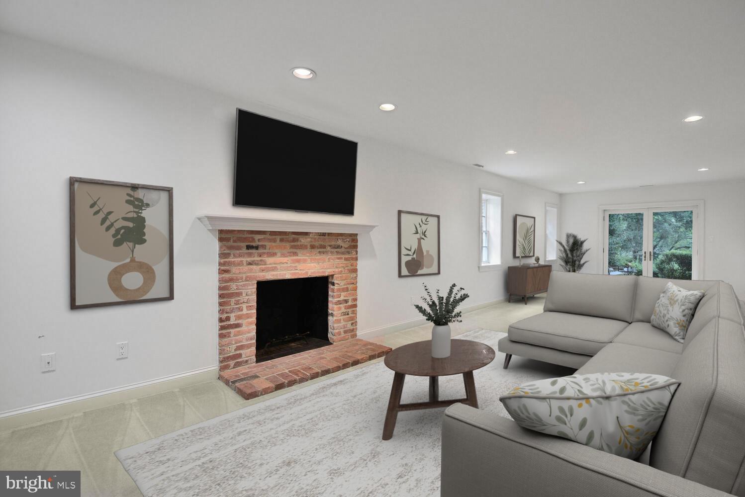 5222 Loughboro Road Northwest Washington, DC 20016 - Photo 34 of 47 a living room with furniture and a fireplace