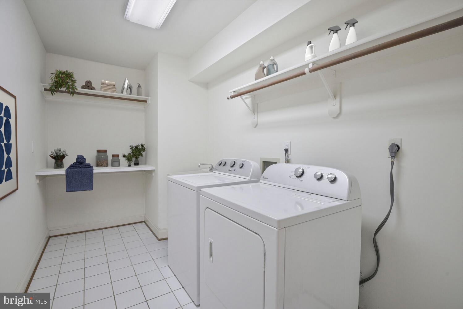 5222 Loughboro Road Northwest Washington, DC 20016 - Photo 36 of 47 a utility room with dryer and washer