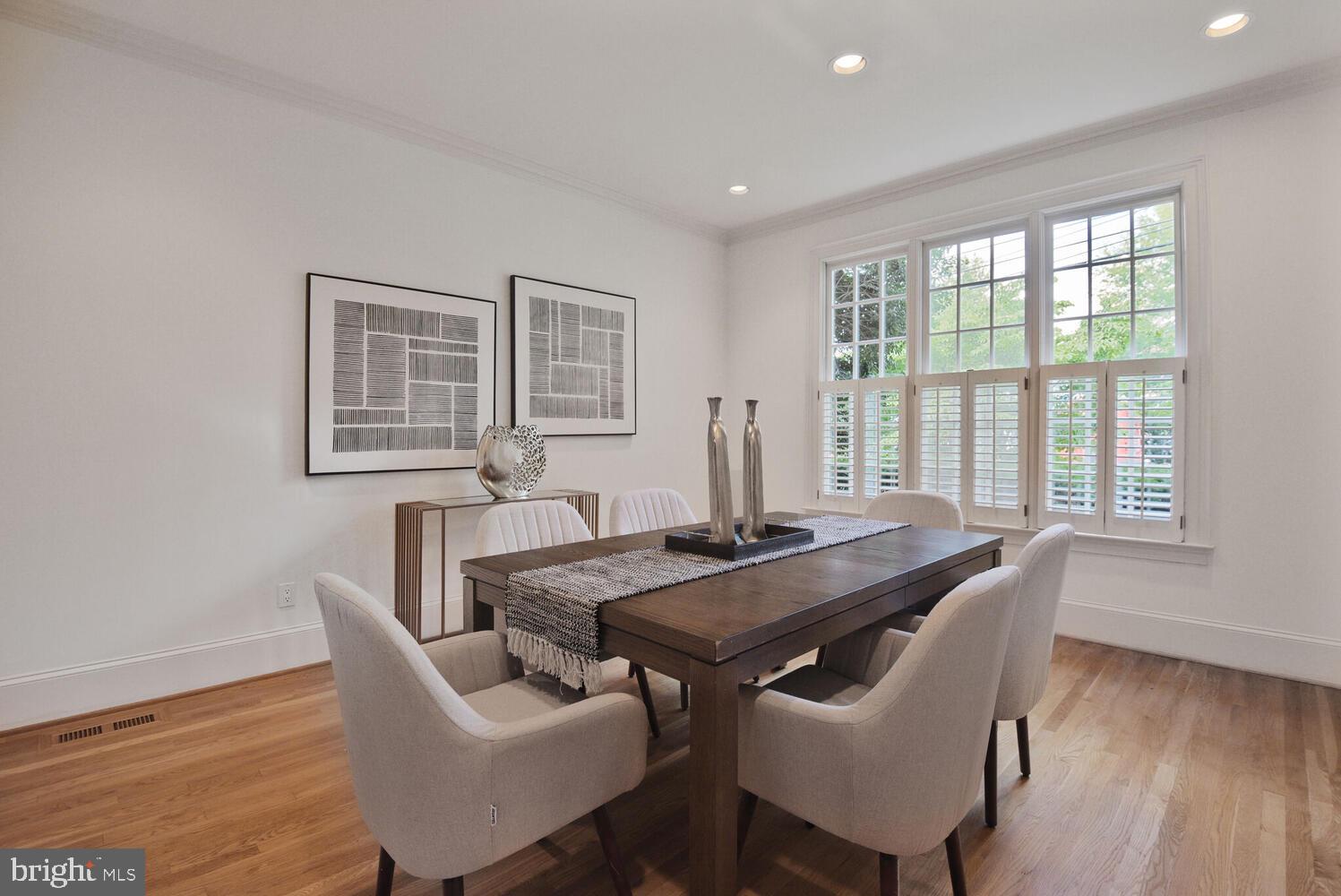 5222 Loughboro Road Northwest Washington, DC 20016 - Photo 5 of 47 a view of a dining room with furniture window and wooden floor