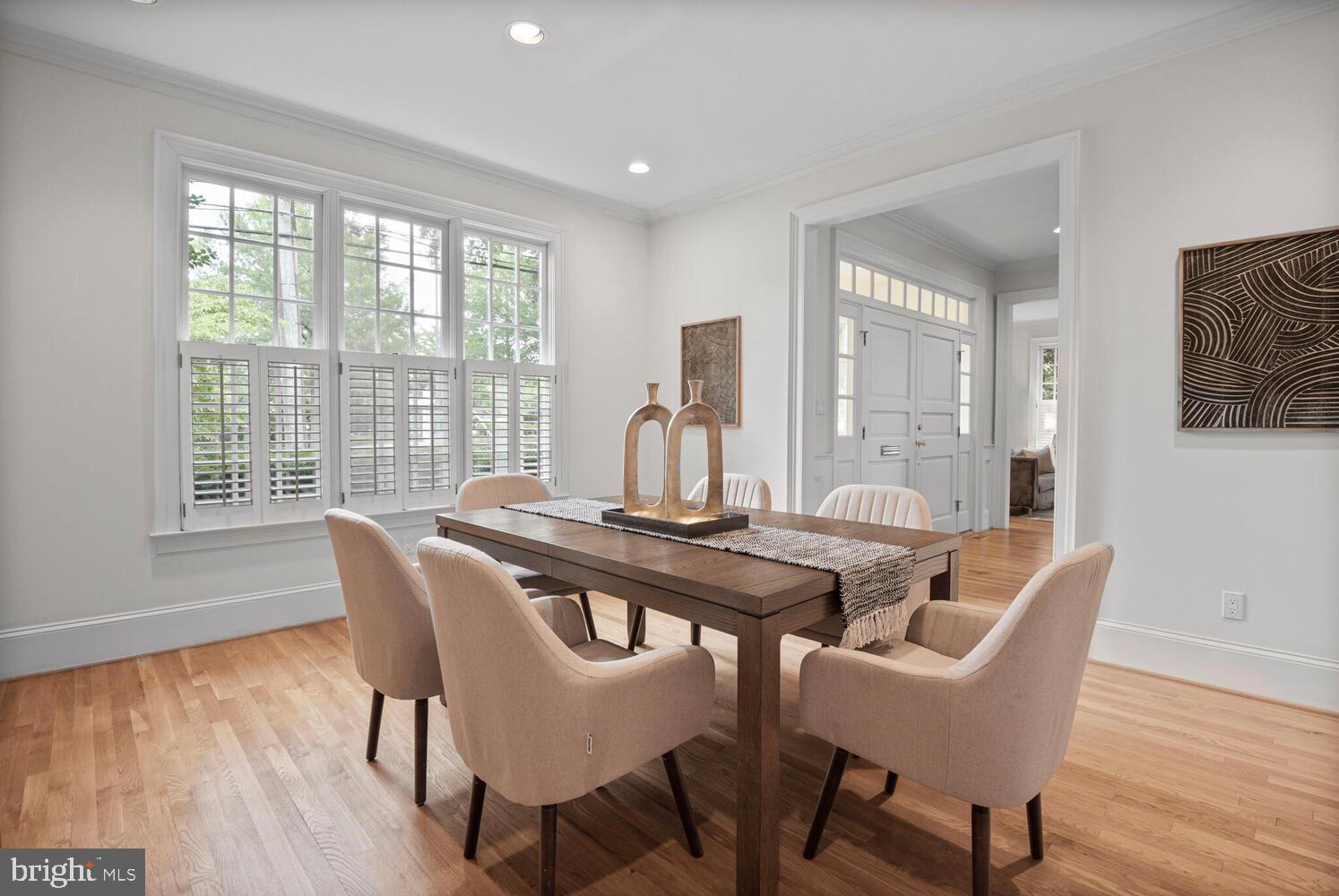 5222 Loughboro Road Northwest Washington, DC 20016 - Photo 6 of 47 a view of a dining room with furniture window and wooden floor