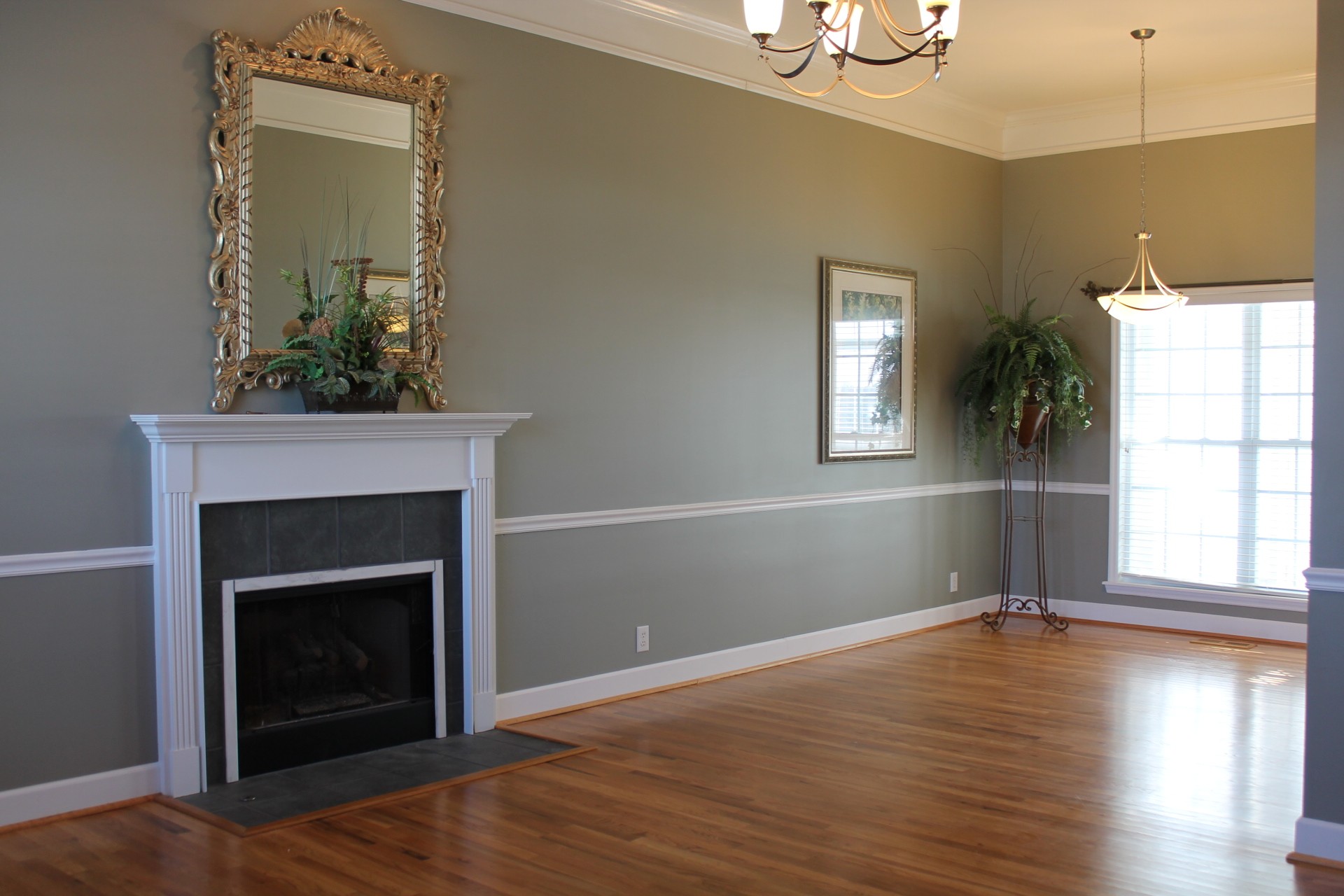 608 Fowler Ford Road Portland, TN 37148 - Photo 13 of 50 a view of a livingroom with wooden floor and a fireplace