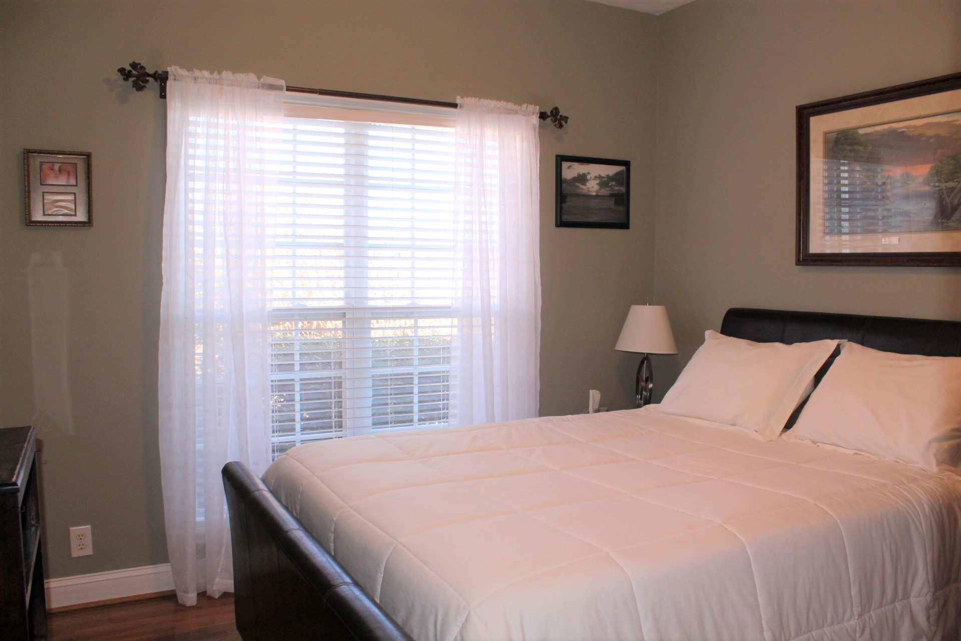 608 Fowler Ford Road Portland, TN 37148 - Photo 16 of 50 a bedroom with a large bed and a window