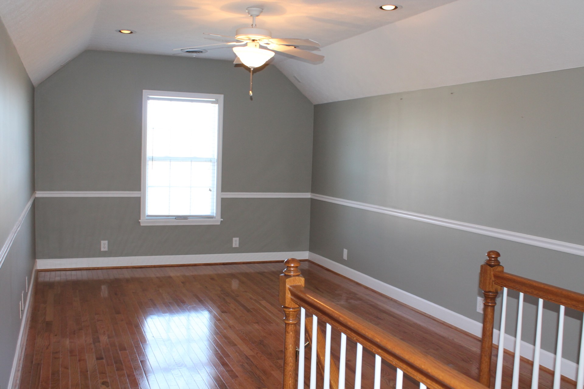 608 Fowler Ford Road Portland, TN 37148 - Photo 18 of 50 a view of empty room with wooden floor and fan