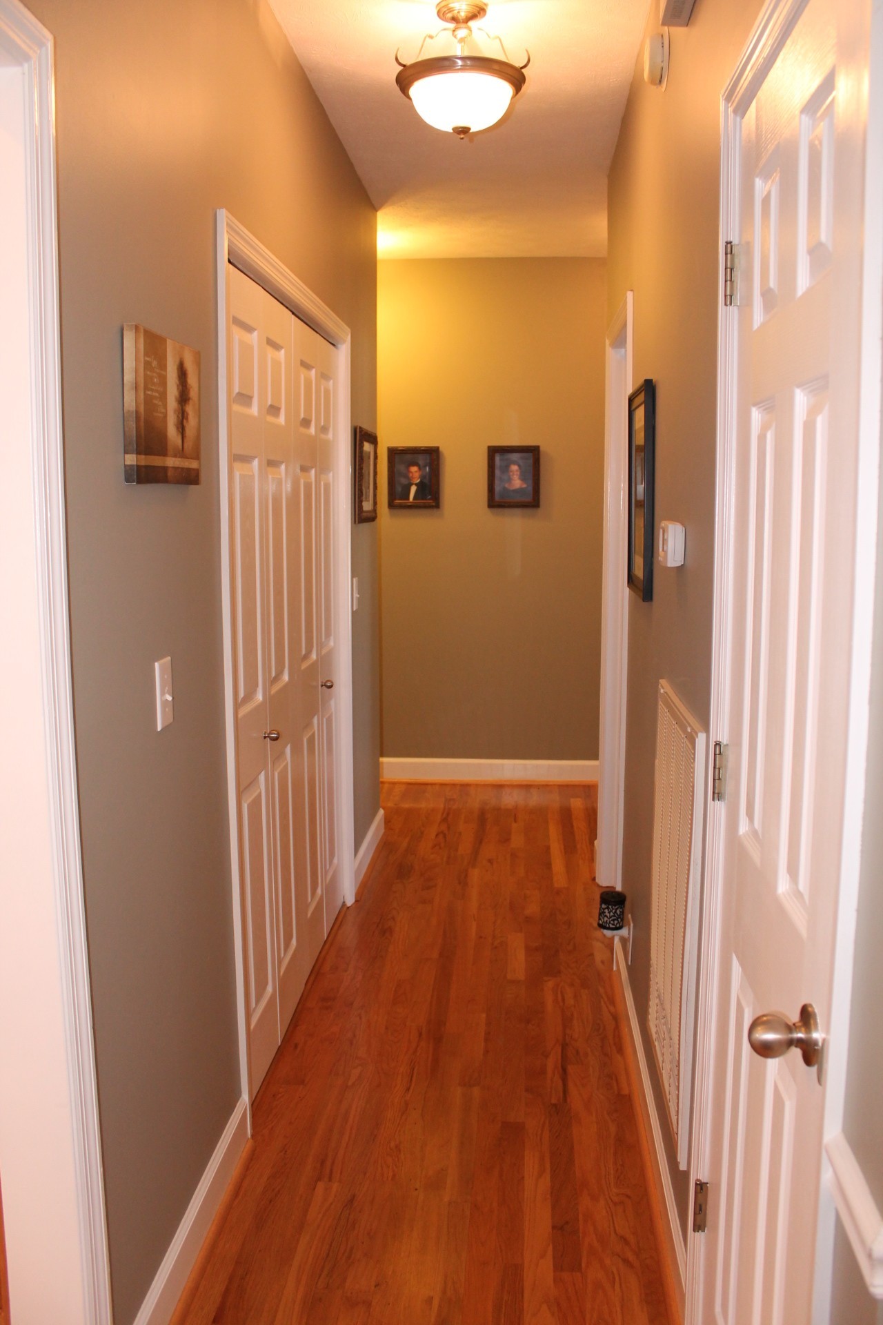 608 Fowler Ford Road Portland, TN 37148 - Photo 22 of 50 a view of a hallway with wooden floor and staircase