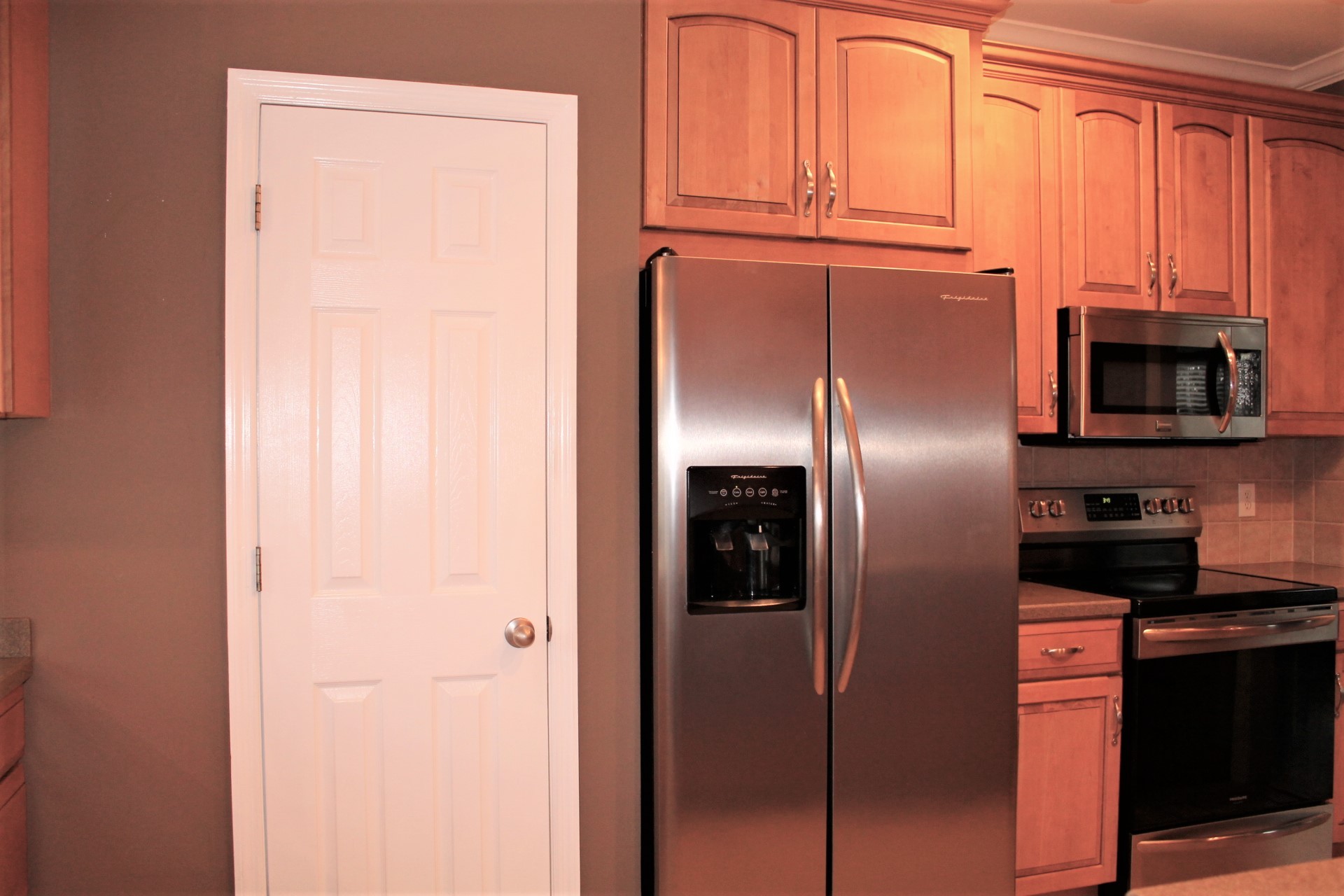 608 Fowler Ford Road Portland, TN 37148 - Photo 25 of 50 a metallic refrigerator freezer sitting in a kitchen