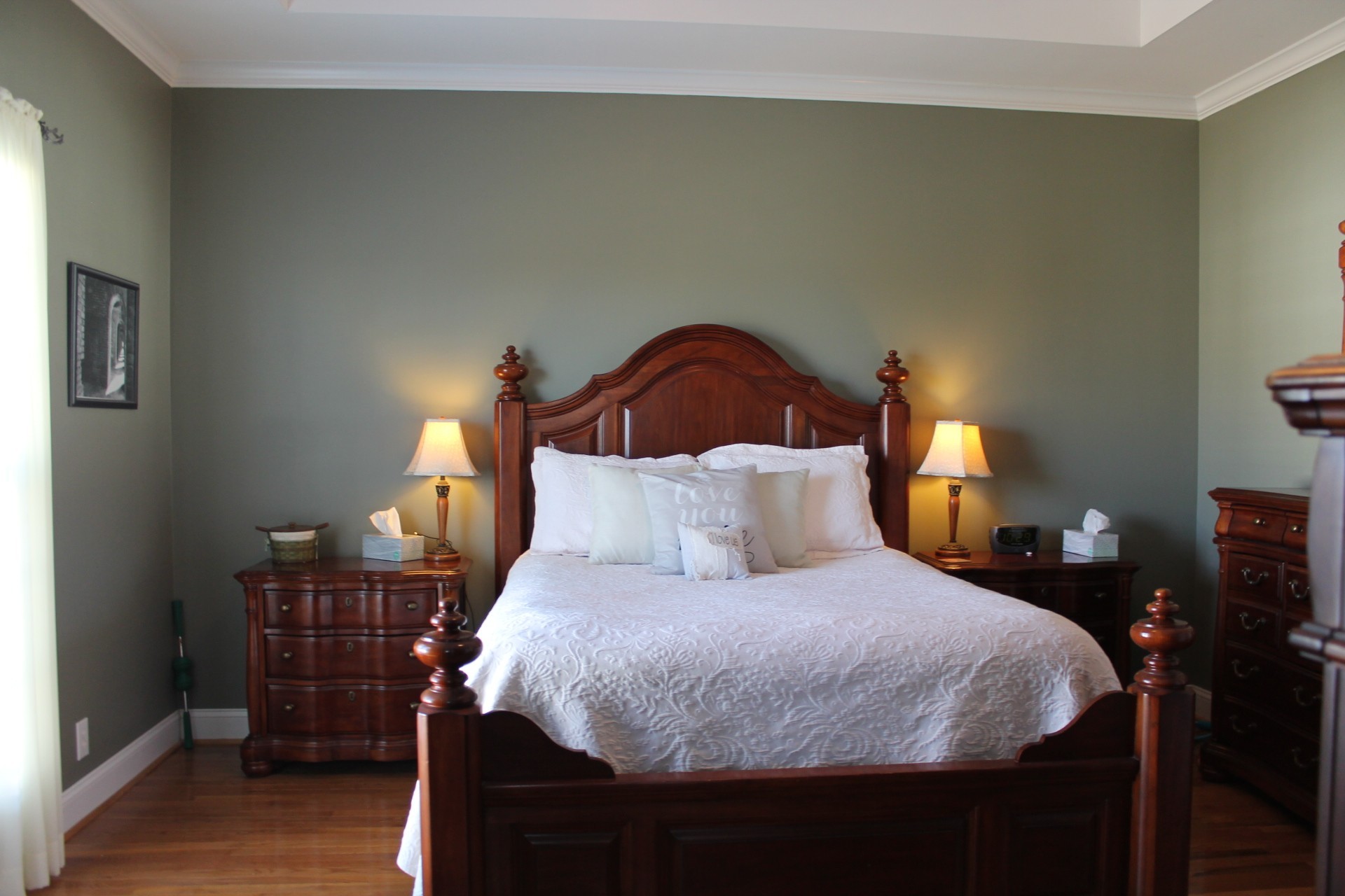 608 Fowler Ford Road Portland, TN 37148 - Photo 4 of 50 a bedroom with a bed and wooden floor