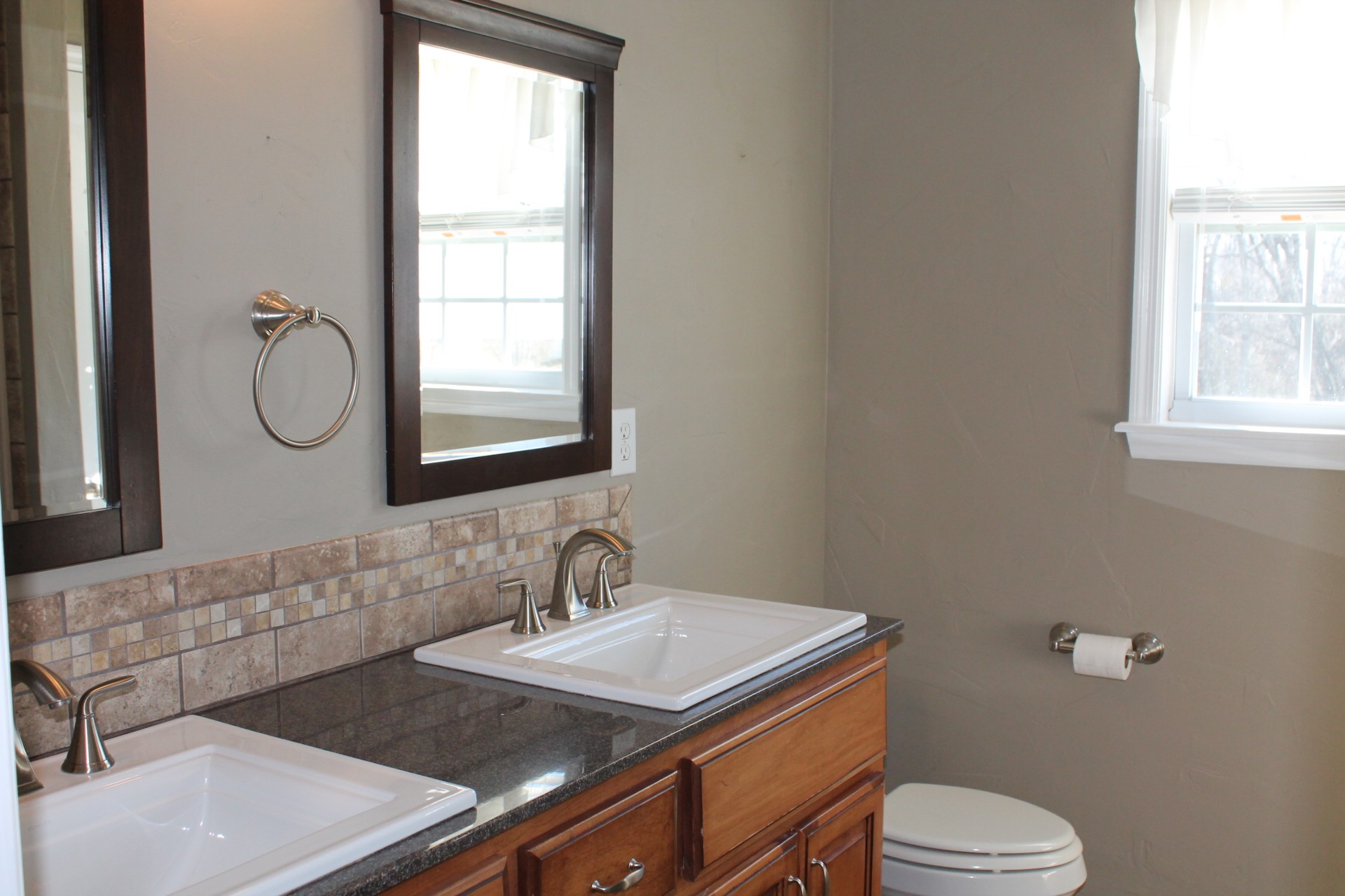 608 Fowler Ford Road Portland, TN 37148 - Photo 44 of 50 a bathroom with a granite countertop toilet sink and mirror