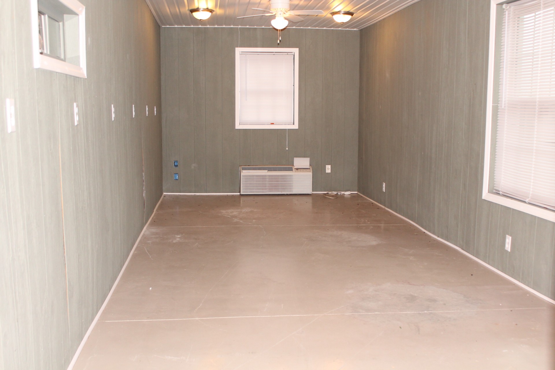 608 Fowler Ford Road Portland, TN 37148 - Photo 46 of 50 an empty room with windows and entrance