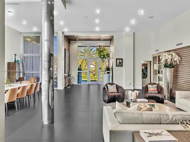 a bedroom with furniture and a book shelf