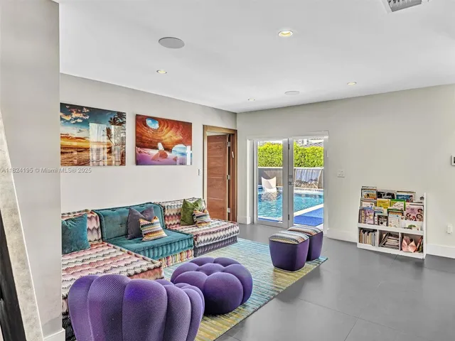 a kitchen with a sink a stove and cabinets