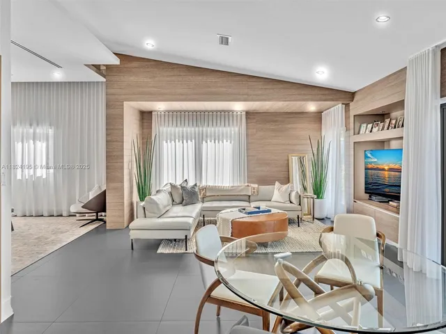 a view of a chairs and table in a patio