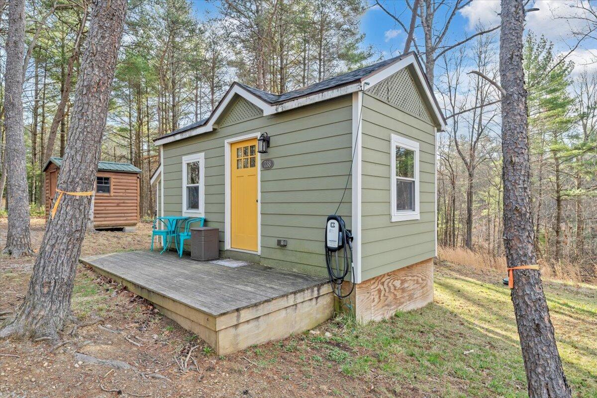738 Jerry Lane Northeast Check, VA 24072 - Photo 21 of 52 a view of a house with a yard and sitting area