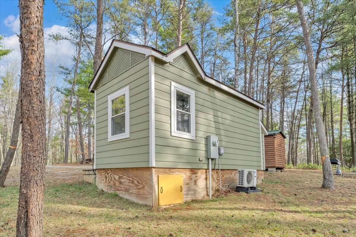738 Jerry Lane Northeast Check, VA 24072 - Photo 23 of 52 a front view of a house with a yard