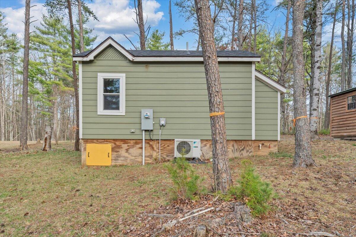 738 Jerry Lane Northeast Check, VA 24072 - Photo 25 of 52 a view of a house with backyard and a tree
