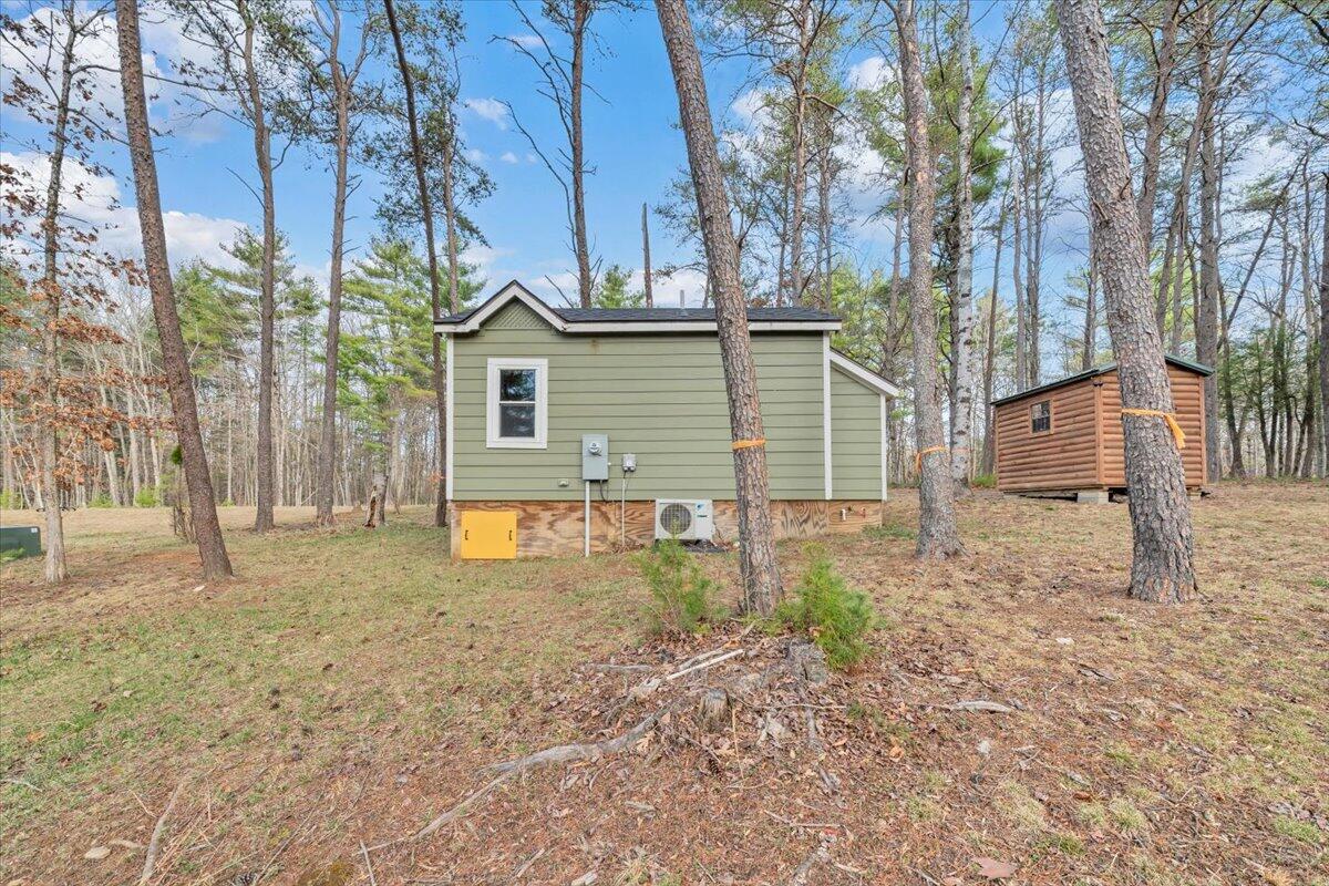 738 Jerry Lane Northeast Check, VA 24072 - Photo 26 of 52 a house that has a tree in front of it