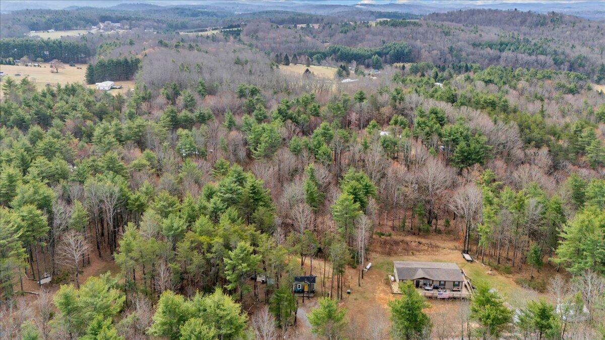 738 Jerry Lane Northeast Check, VA 24072 - Photo 49 of 52 an aerial view of residential house with outdoor space and trees all around