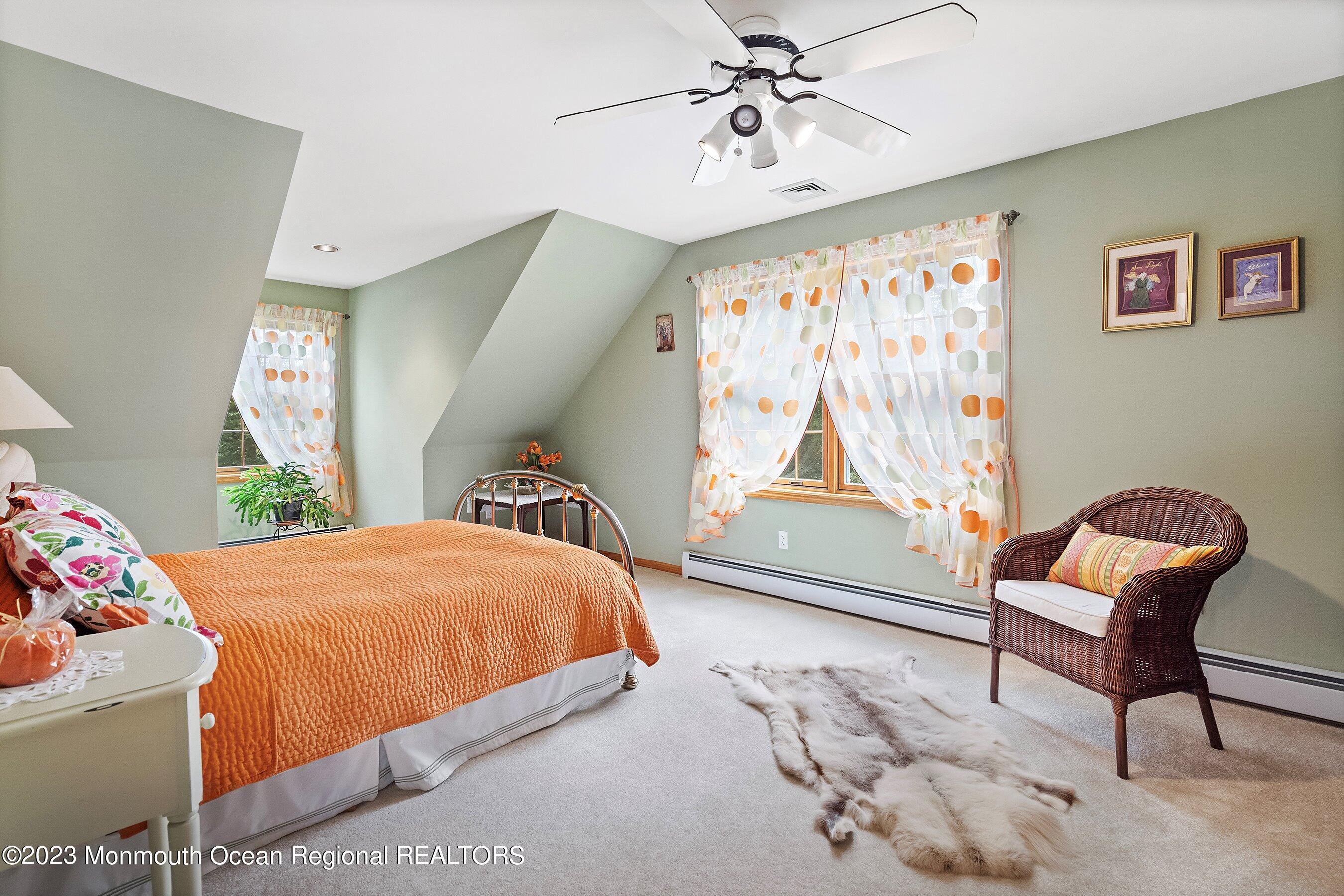 172 Jackson Mills Road Freehold, NJ 07728 - Photo 15 of 20 a bedroom with furniture and a window