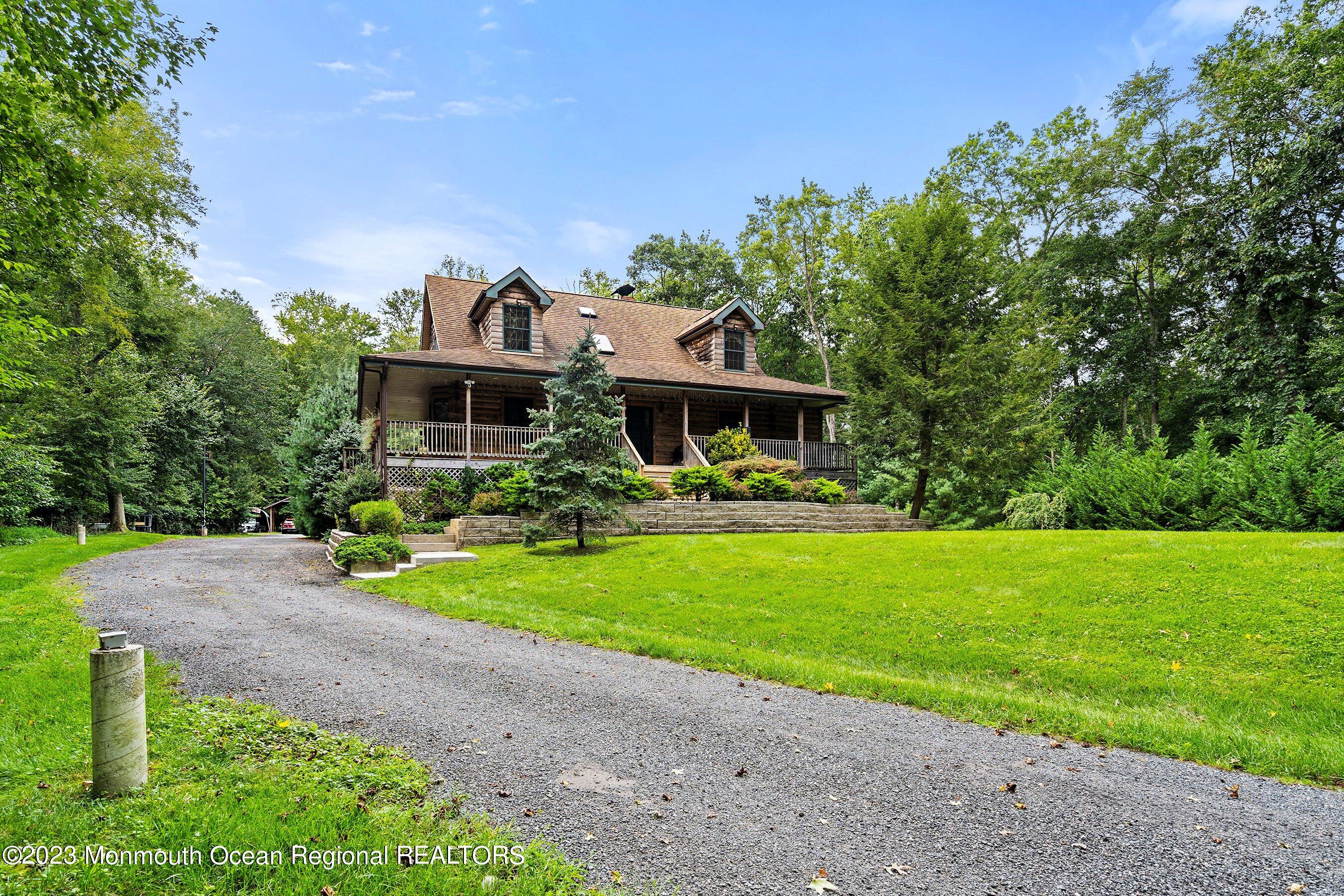 172 Jackson Mills Road Freehold, NJ 07728 - Photo 3 of 20 a front view of a house with a yard